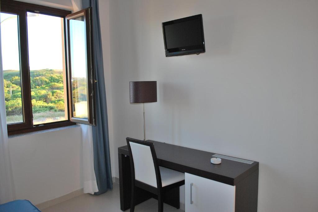 Buddi Hotel Platamona Pokoj fotografie