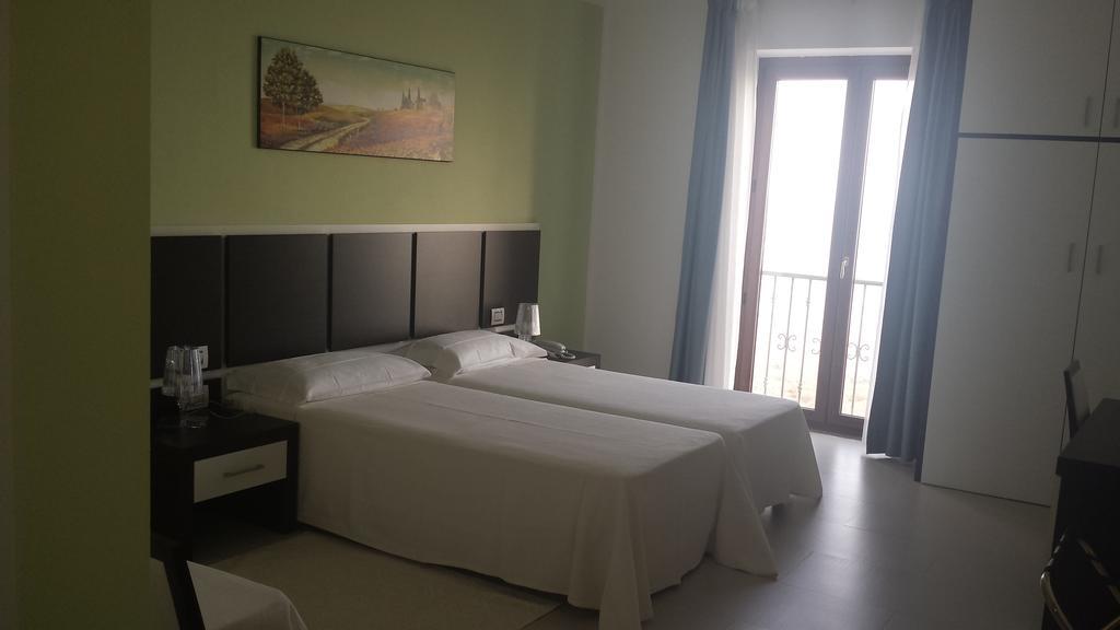 Buddi Hotel Platamona Pokoj fotografie