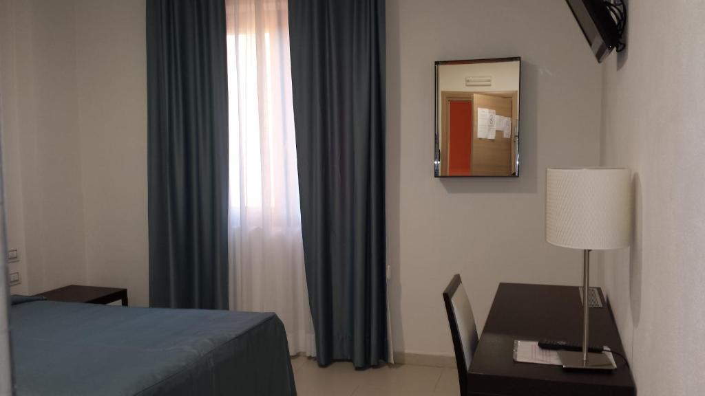 Buddi Hotel Platamona Pokoj fotografie