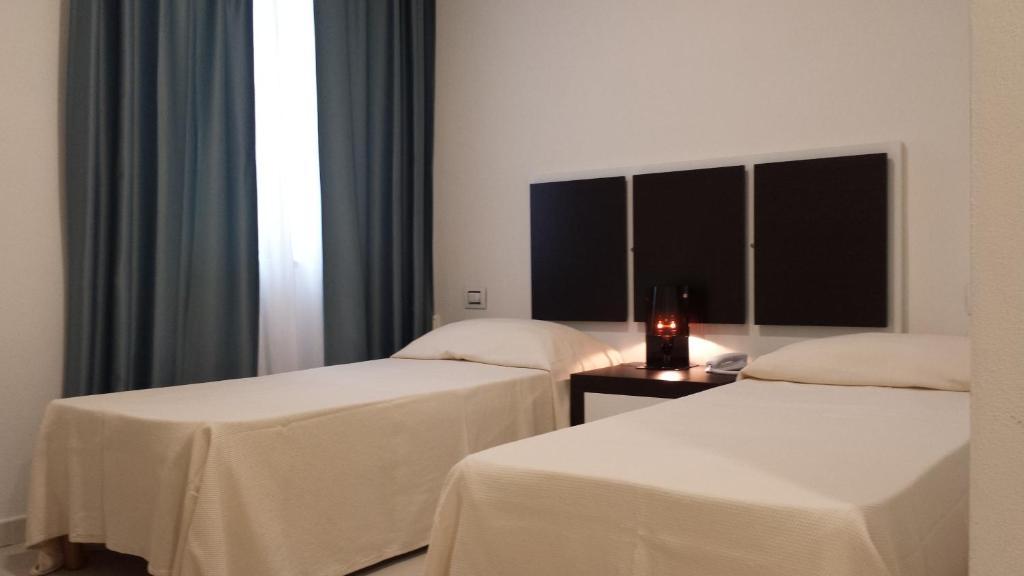 Buddi Hotel Platamona Pokoj fotografie